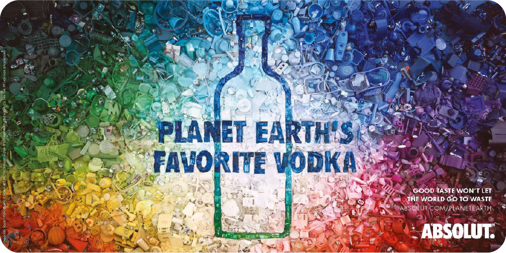 An Absolut Vodka ad using illustrative design, with the bottle's shape created from a rainbow collage of plastic waste to promote an eco-friendly message.